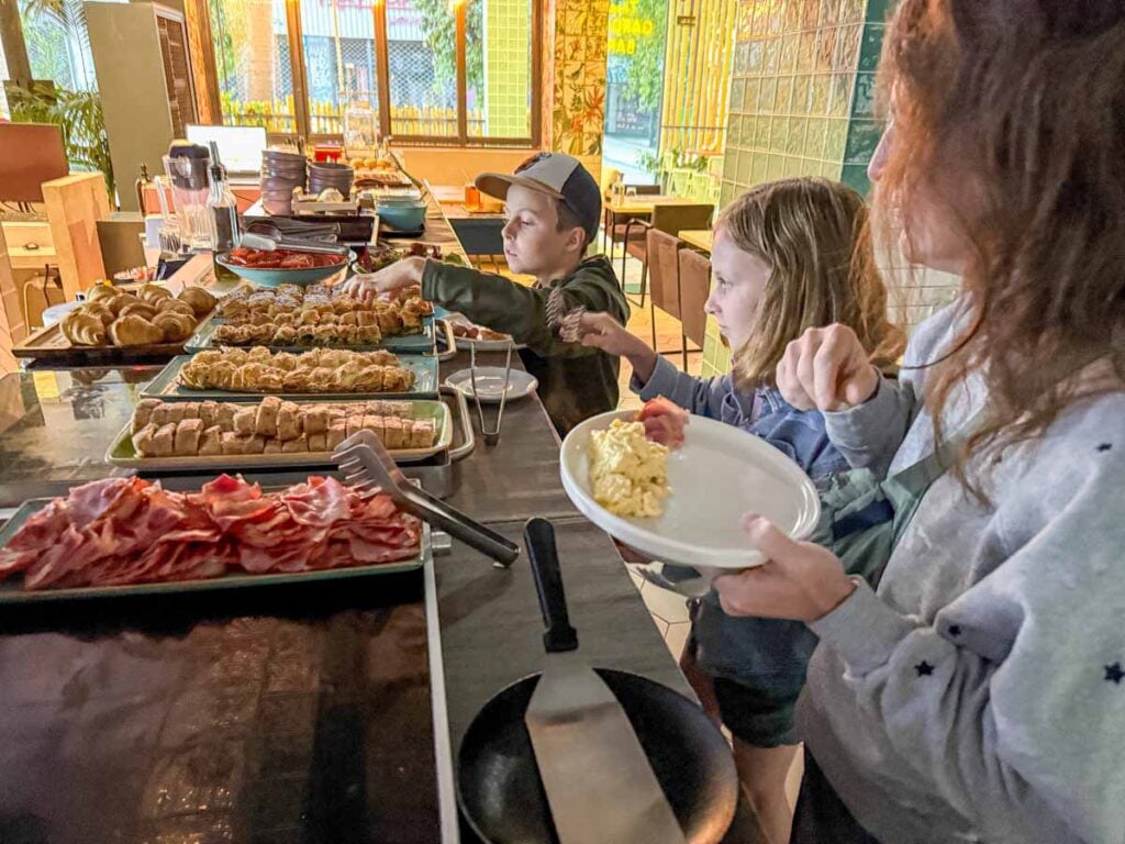 The Brewer family, of the Family Can Travel blog, enjoys the amazing buffet breakfast at the family-friendly Colors Hotel Athens.