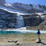 Things to do in La Paz Bolivia with kids - Charquini Laguna Emerald hiking tour An 11-year old girl admires Laguna Emerald while on a kid-friendly hiking tour up Mt. Charquini near La Paz, Bolivia.