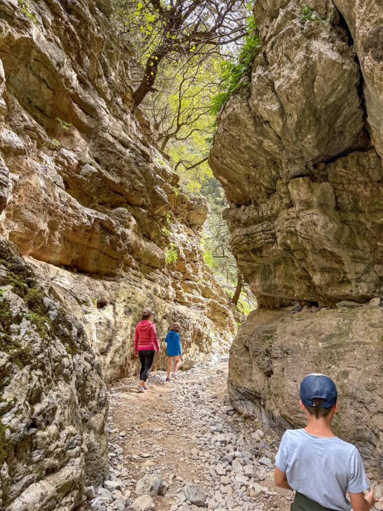 Celine Brewer and her kids enjoy a family walk through the Imbros Gorge Hike while on vacation in Crete.