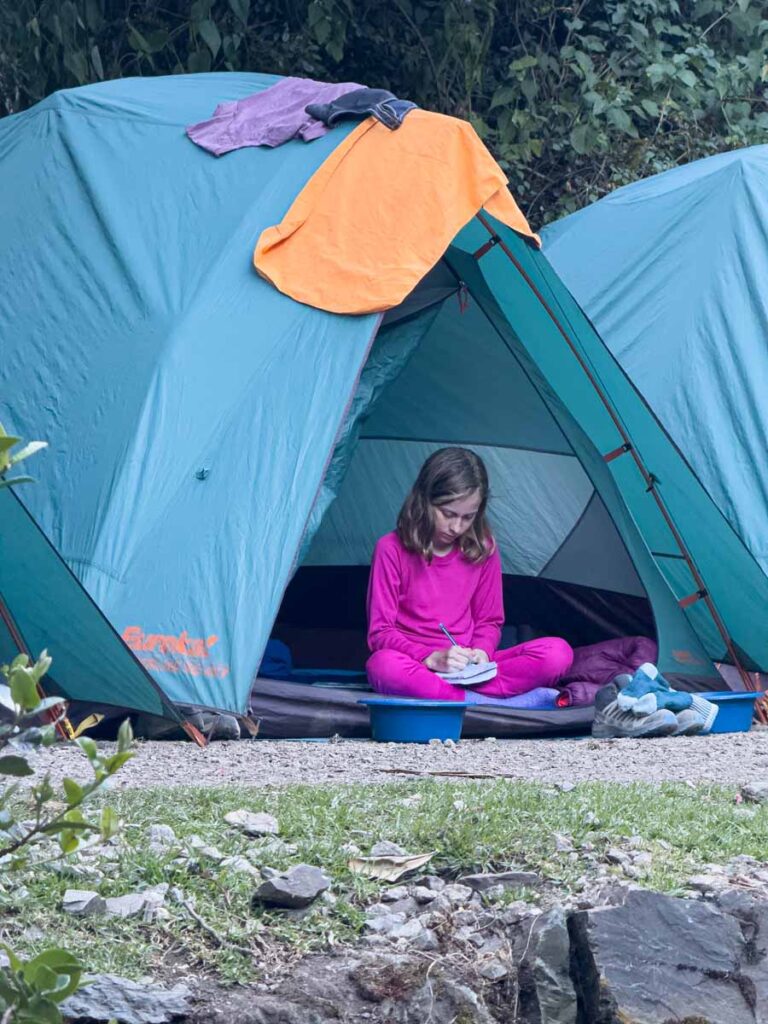 an 11-year old girl writes in her travel journal after the first day of hiking the Inca Trail with her family.