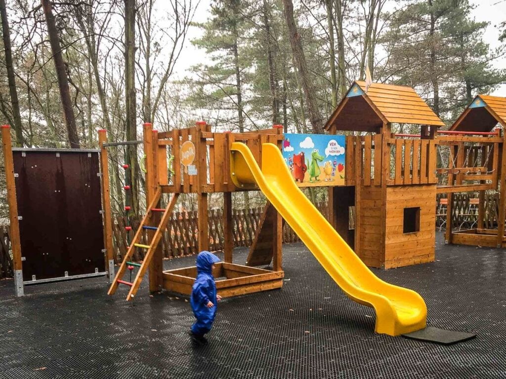 a toddler at a playground in Karlovy Vary near the Diana Lookout.