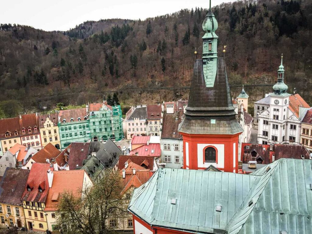 an aerial view of the colorful town of Loket, Czech Republic.