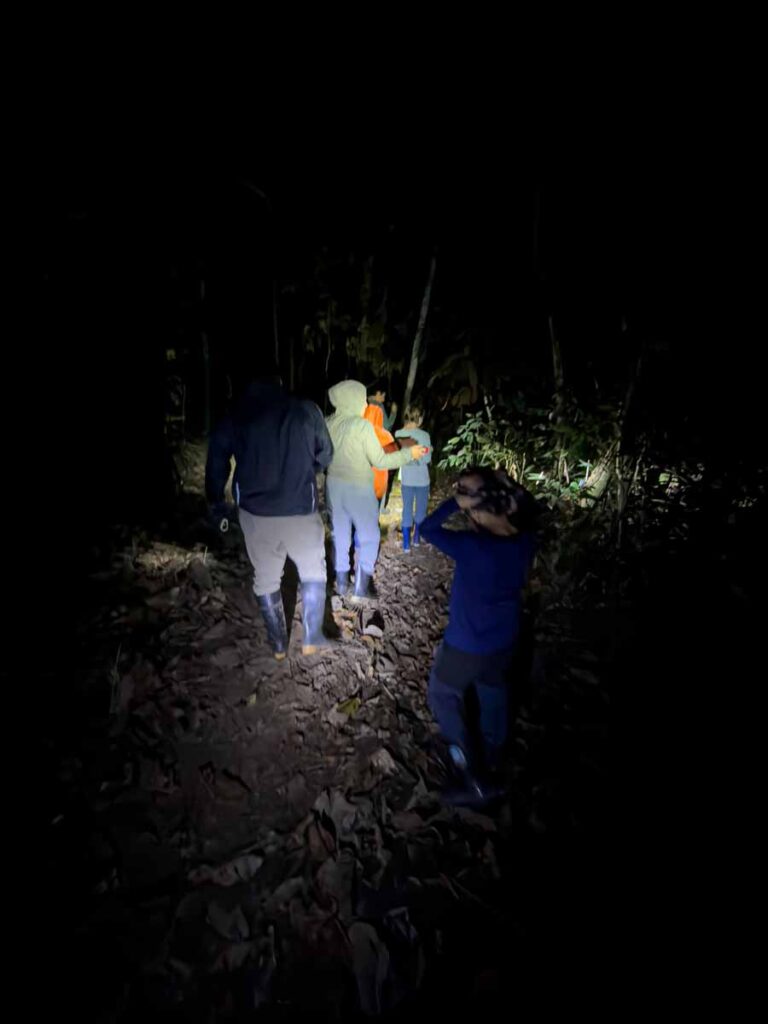 The Brewer family, from FamilyCanTravel.com, ventures into the jungle for a night walk on a tour to Manu National Park.