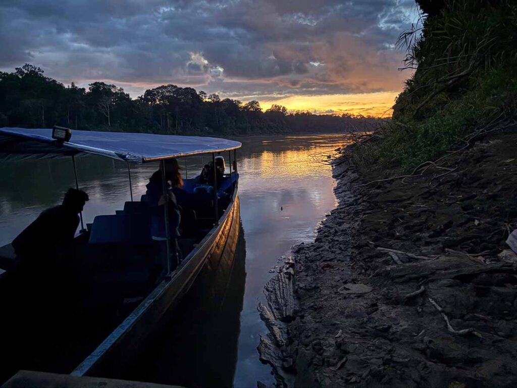 a beautiful sunrise over the Rio Madre de Dios in Manu National Park.