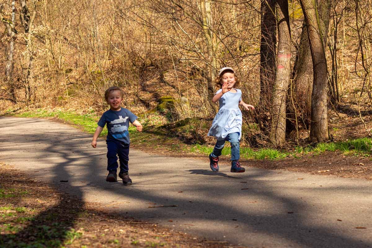 The Brewer kids, from the FamilyCanTravel.com blog, enjoy an easy walk in Divoka Sarka park while on a family trip to Prague.