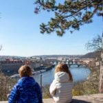 Prague with kids - Letna Park Family Walk City Views The Brewer kids, from the FamilyCanTravel.com blog, enjoy a view of Prague from an easy family walk in Letna Park.