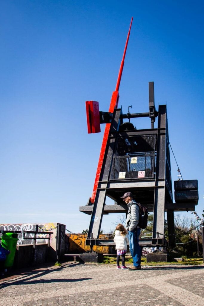 Dan Brewer, owner of FamilyCanTravel.com, admires the giant metronome in Letna Park while on a family trip to Prague.