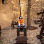 Prague with kids - toddler on a cannon