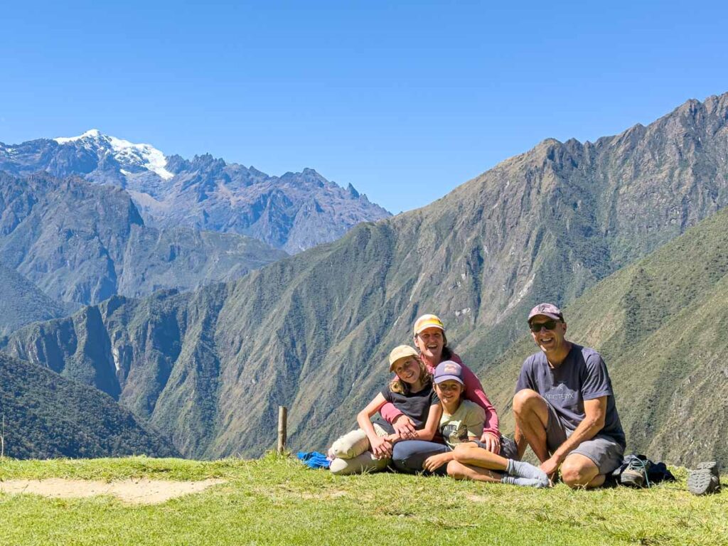 Dan and Celine Brewer, owners of FamilyCanTravel.com, visit the Intipata Sun Terraces on Day 3 of their family trekking trip on the Inca Trail.