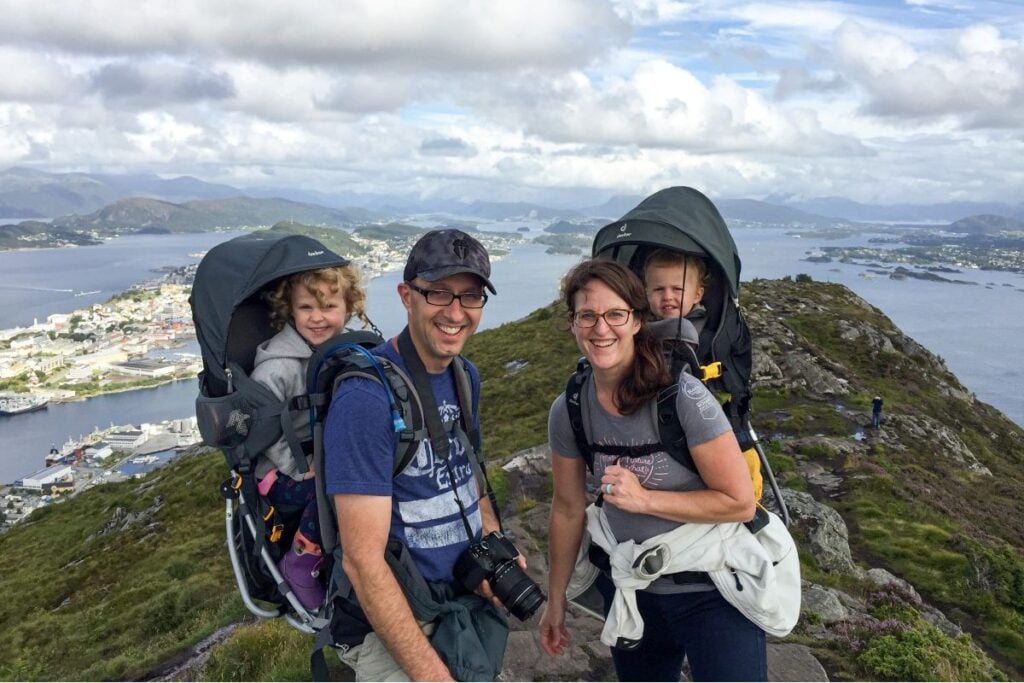 Dan and Celine Brewer, owners of FamilyCanTravel.com, enjoy a hike in Alesund while on a family trip to Norway.