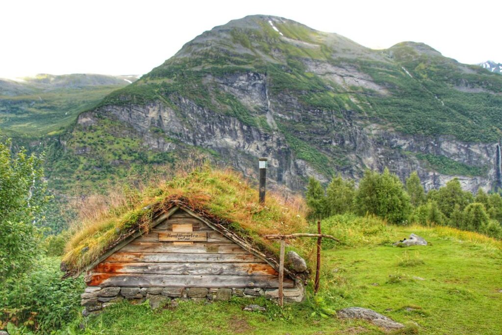 a moss covered Homlongsaetra farm house seen on the Skageflå Hike from Geiranger, Norway.