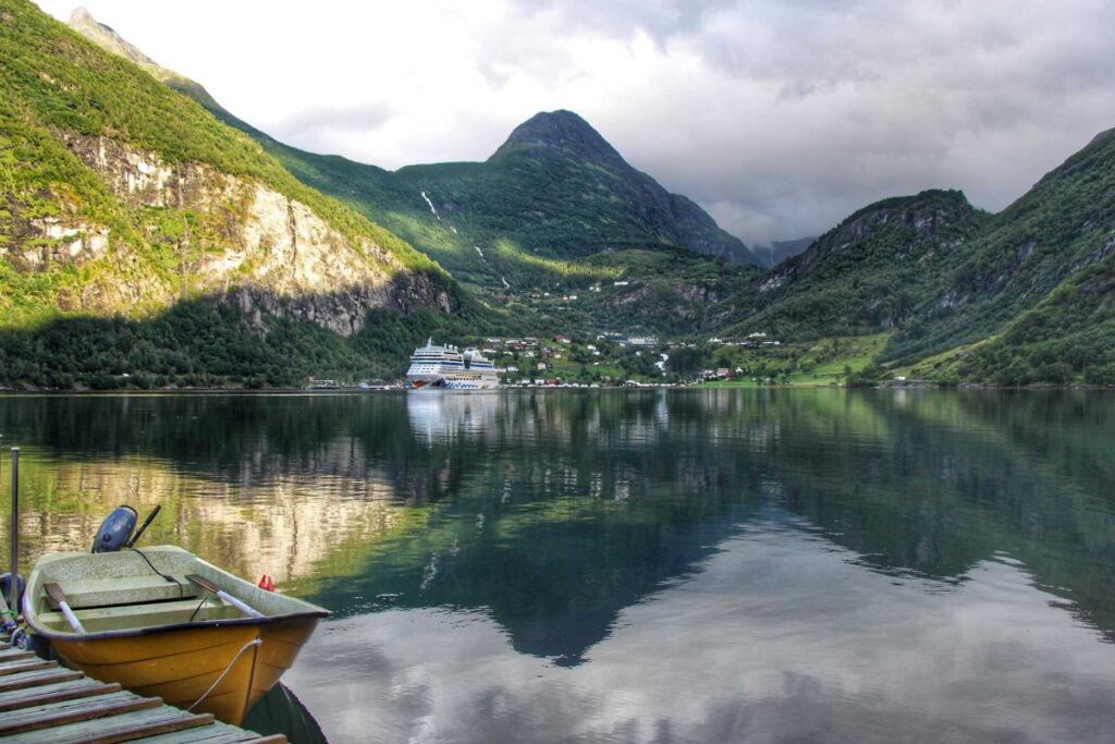 The view from our family-friendly Geiranger cabin looking at a cruise ship across the water.