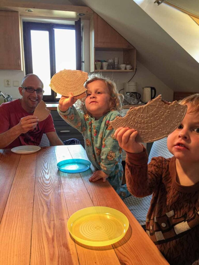 Dan Brewer, owner of FamilyCanTravel.com, enjoys a treat with his kids in a vacation rental in the Czech Republic.