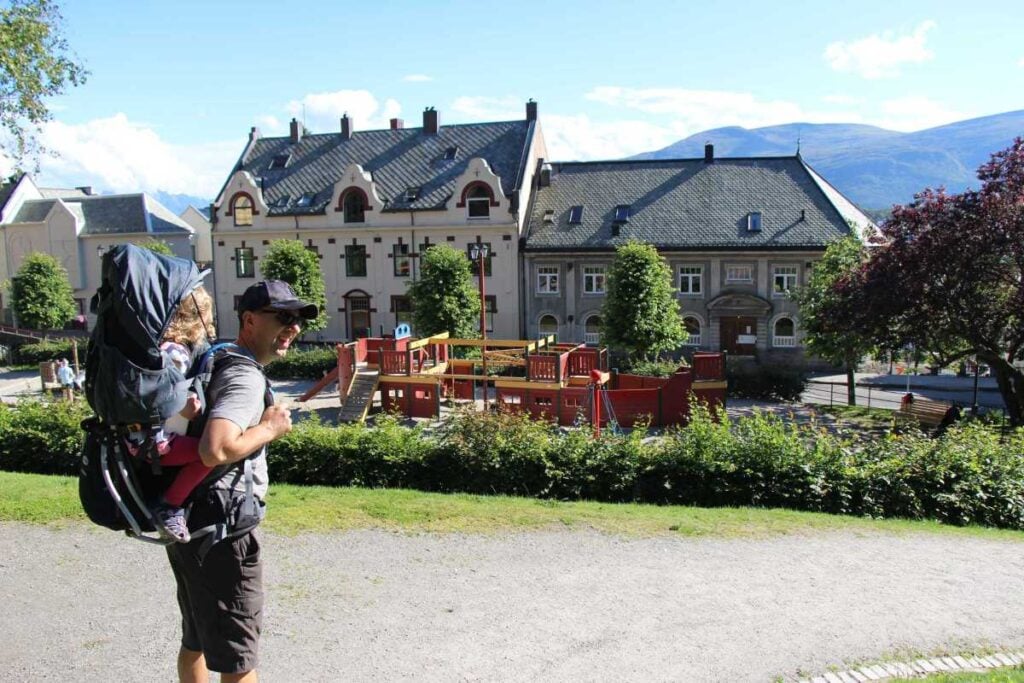 Dan Brewer, owner of FamilyCanTravel.com, visits a playground in Alesund with his kids.