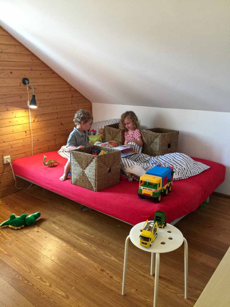 The Brewer kids, from the Family Can Travel blog, relax in their Airbnb in Bohemian Paradise, Czech Republic.