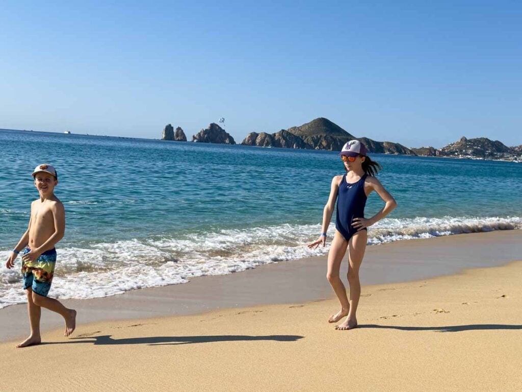 The Brewer kids enjoy a family walk along the beach during their second stay at the Riu Palace Cabo San Lucas  all-inclusive resort.