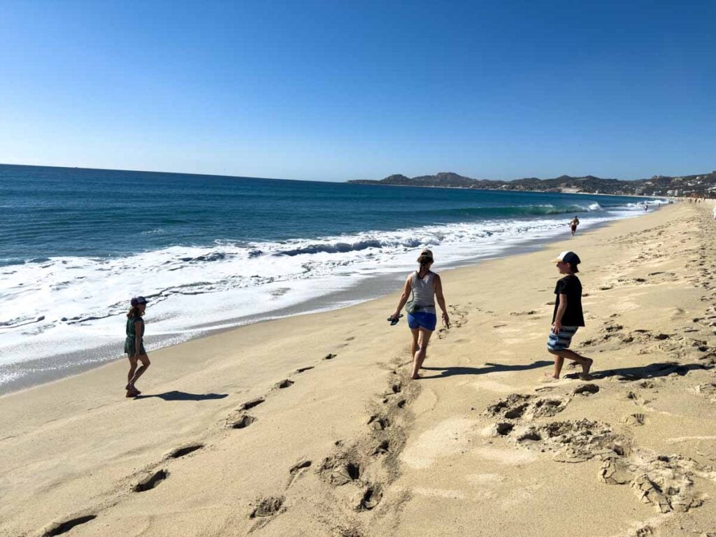 Celine Brewer, owner of FamilyCanTravel.com, enjoys a family walk on Playa Hotelera during a family trip to San Jose del Cabo, Mexico.