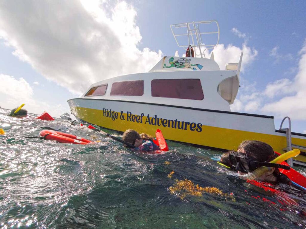 The Brewer family, from FamilyCanTravel.com, enjoys a full-day snorkeling tour from Ambergris Caye.