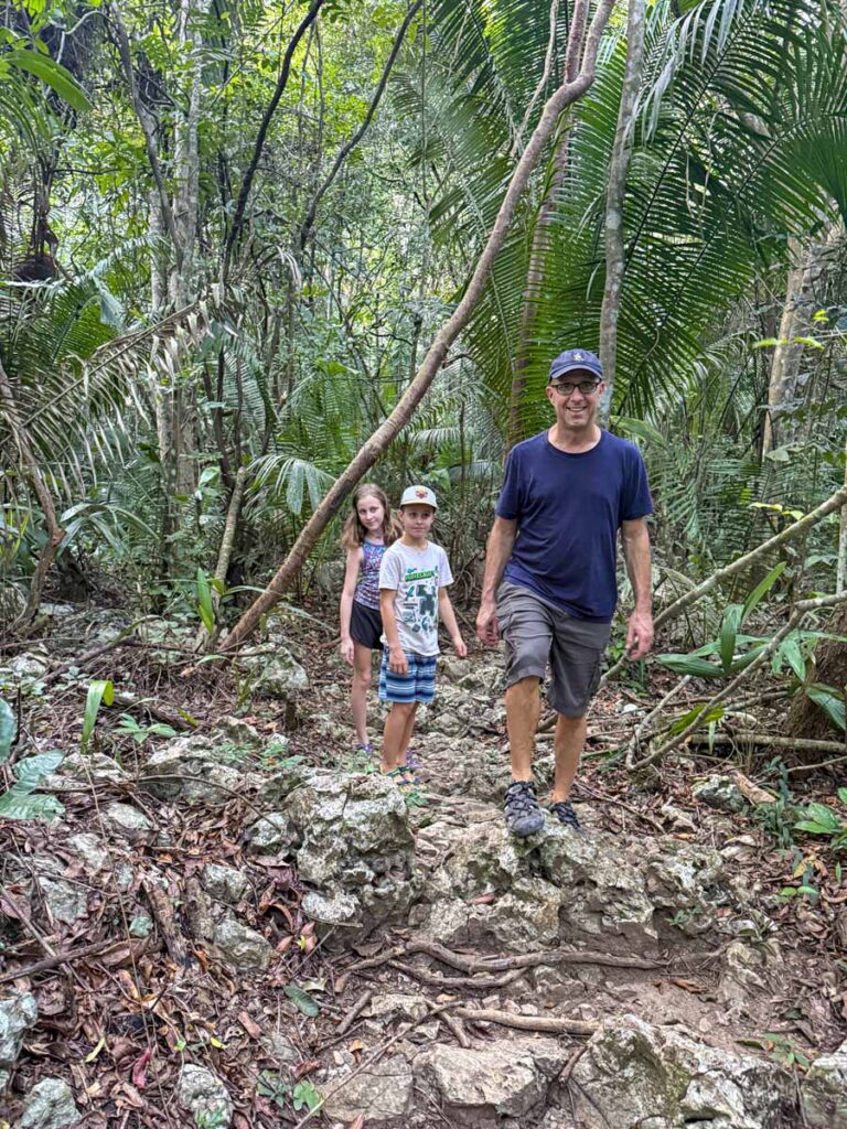 Dan Brewer, owner of Family Can Travel, goes for a nature walk with his family during a 5-night stay at the Sweet Songs Jungle Lodge in Belize.