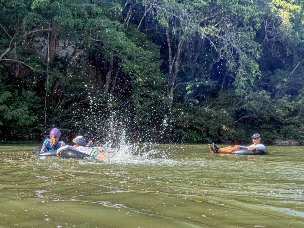 The Brewer family has fun river tubing at the Sweet Songs Jungle Lodge in Belize.