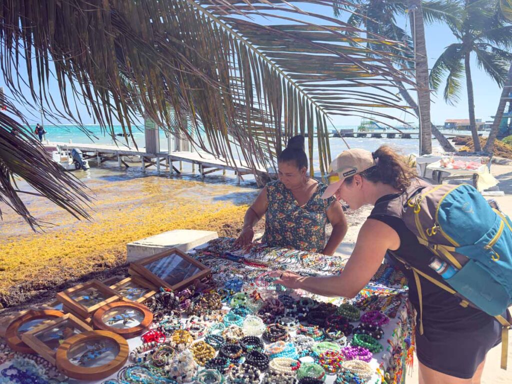 Celine Brewer, owner of FamilyCanTravel.com, enjoys some souvenir shopping on Front Street in Ambergris Caye.
