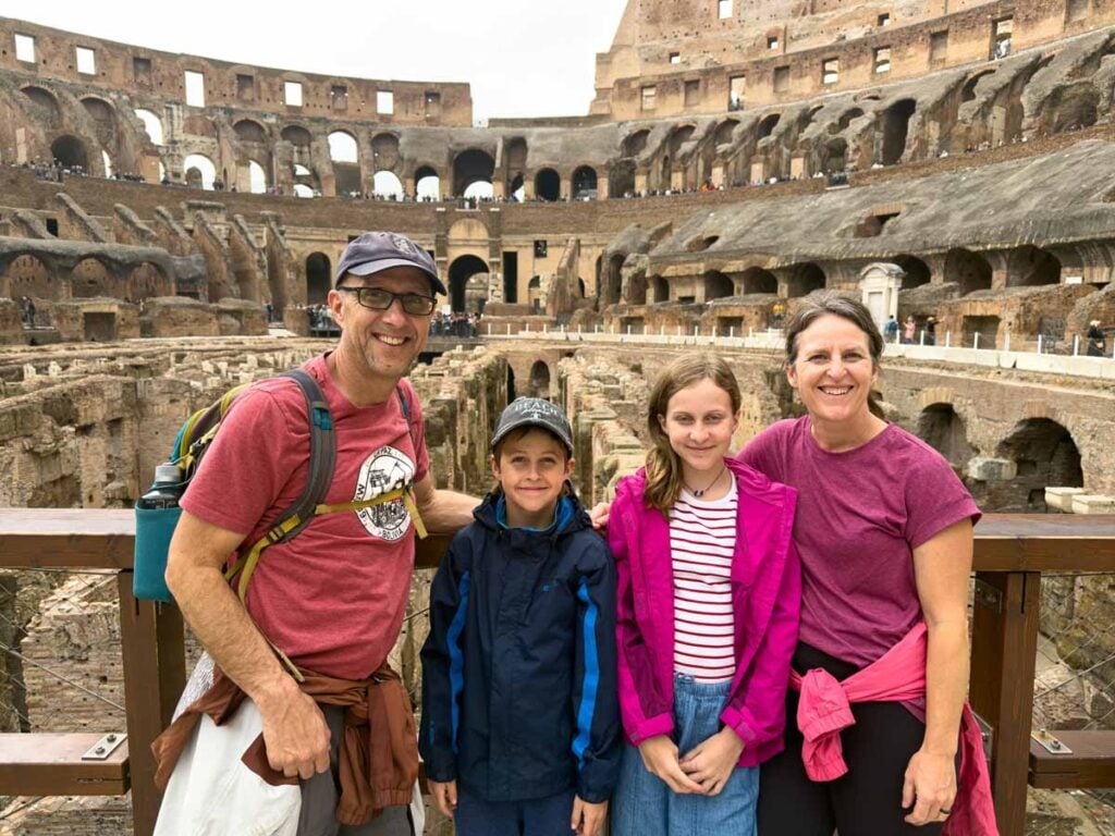 Dan and Celine Brewer, owners of FamilyCanTravel.com, visit the Colosseum with their kids during a 24-hour visit to Rome, Italy.