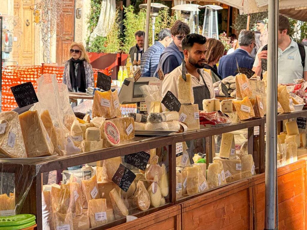 A cheese vendor at the Campo de'Fiori market in Rome, Italy.