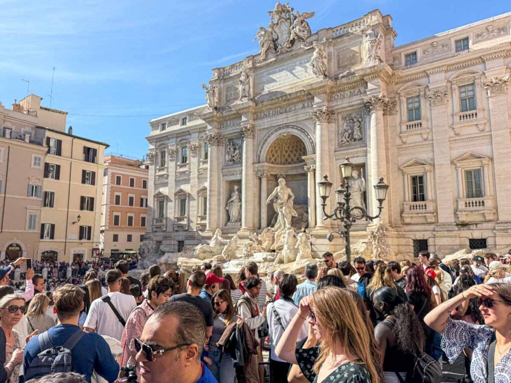 A very busy Trevi Fountain on Easter Sunday in Rome, Italy.