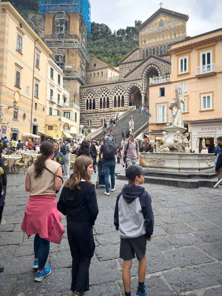 Celine Brewer and her kids explore the main square in Amalfi, Italy.