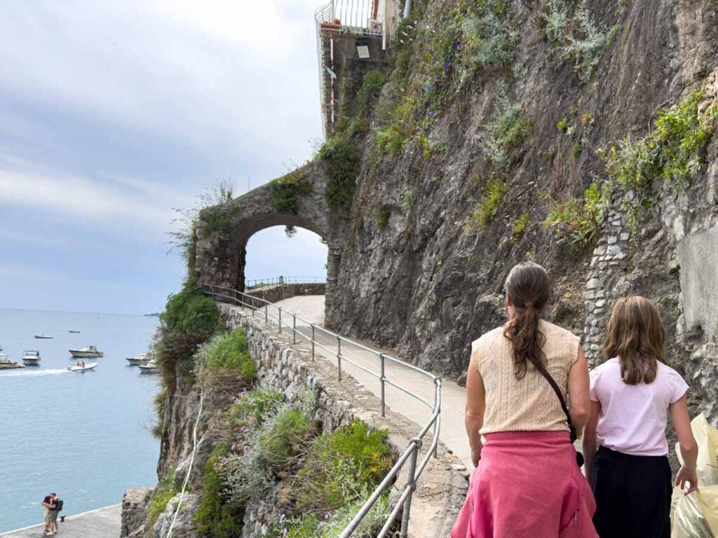 Celine Brewer and her kids walk the Via Positanesi d’America walking path in Positano, Italy.