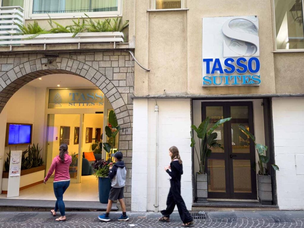 Celine Brewer, owner of Family Can Travel, walks into the Tasso Suites Hotel in Sorrento, Italy.