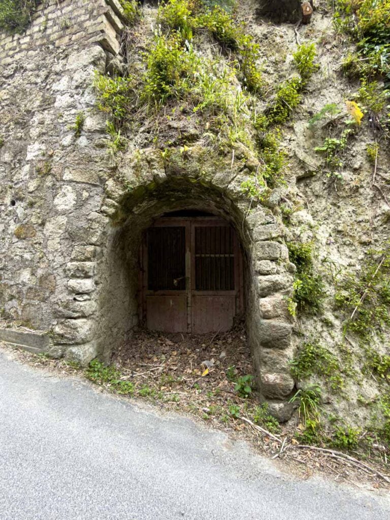 houses built into the side of the mountain on the Fontana to Monte Epomeo Hike on Ischia.