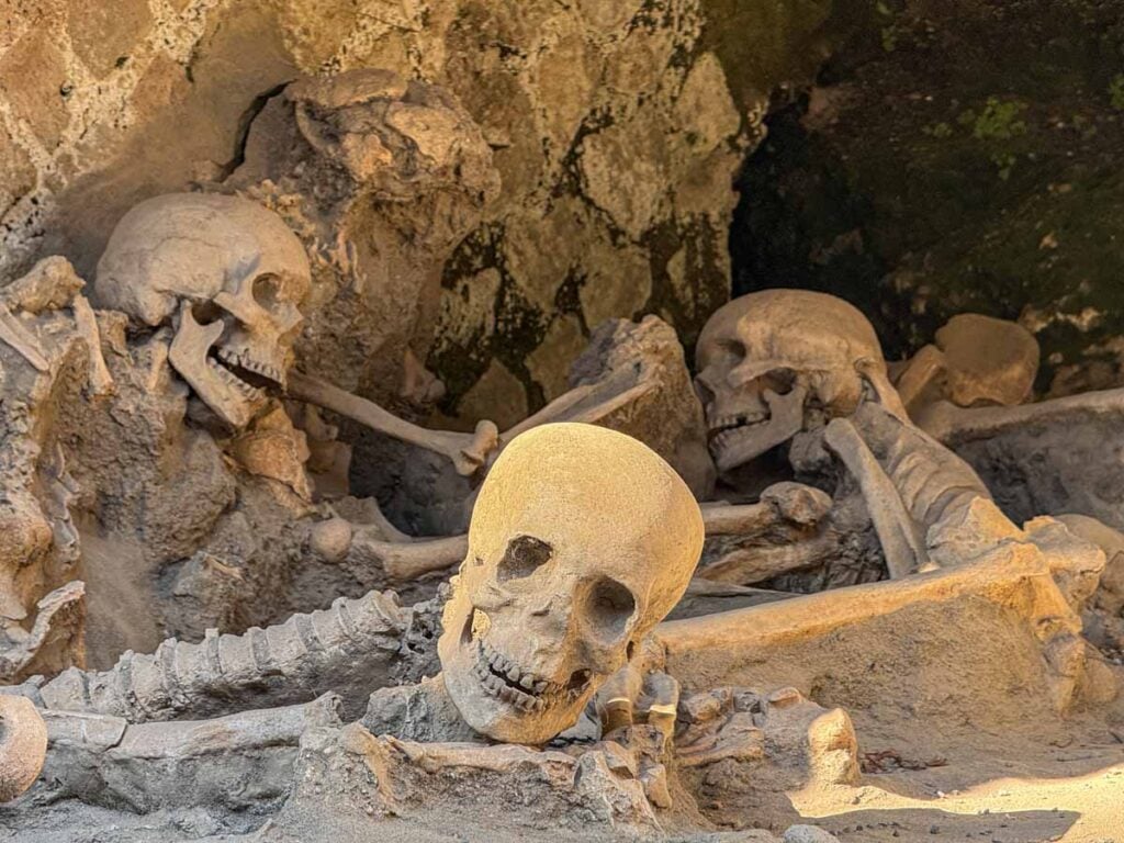 A pile of skeletons lie by the old harbour in the Herculaneum ruins near Pompeii, Italy.