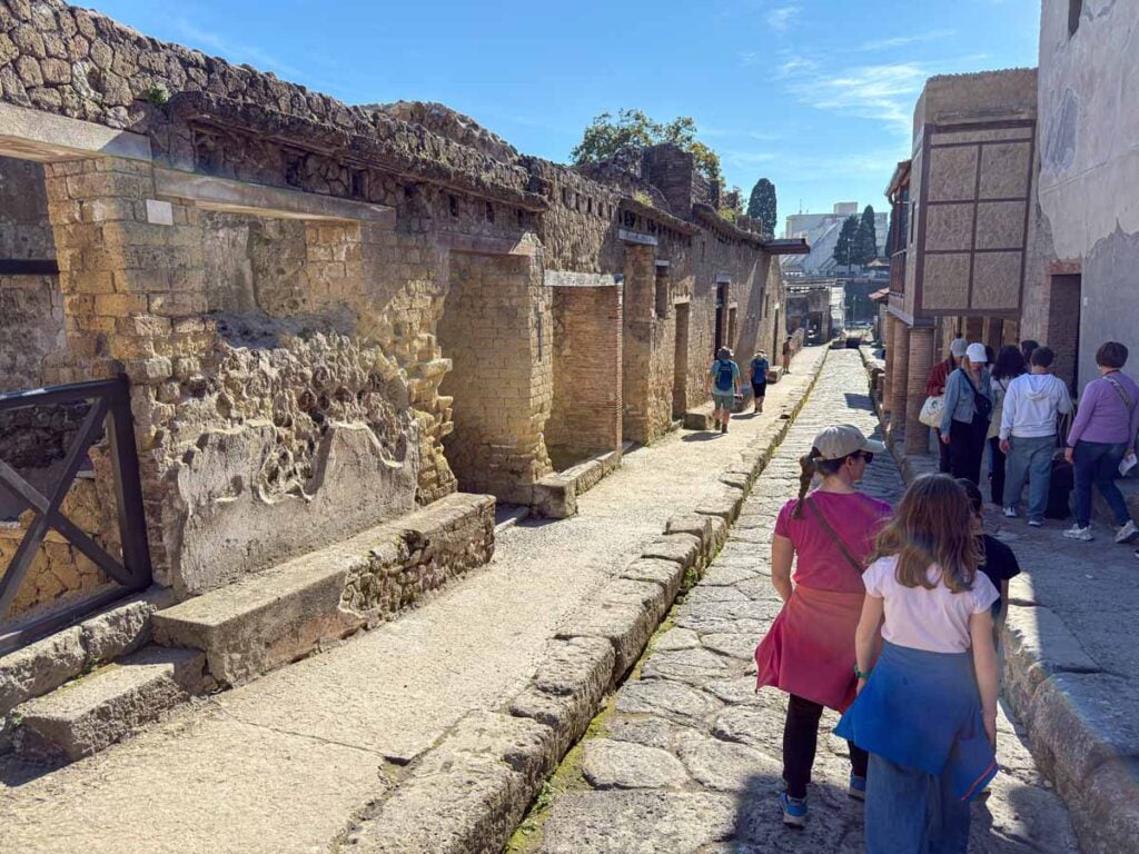 Celine Brewer and her kids explore the ruins of Herculaneum near Mt. Vesuvius.