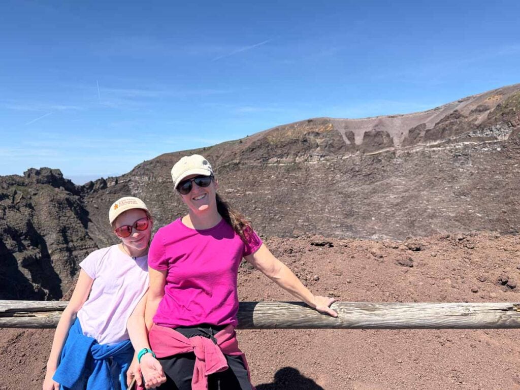 Celine Brewer and her daughter stand near the volcanic crater at the top of Mount Vesuvius near Pompeii, Italy.