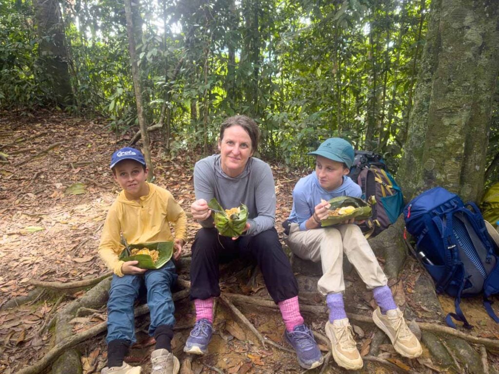 Celine Brewer, owner of FamilyCanTravel.com, and her kids are dressed for protection against mosquitos and leeches in the Sumatra jungle.