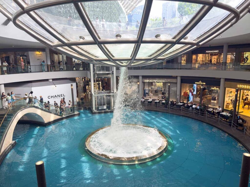 A waterfall created by the Rain Oculus at the Shoppes at Marina Bay Sands in Singapore.