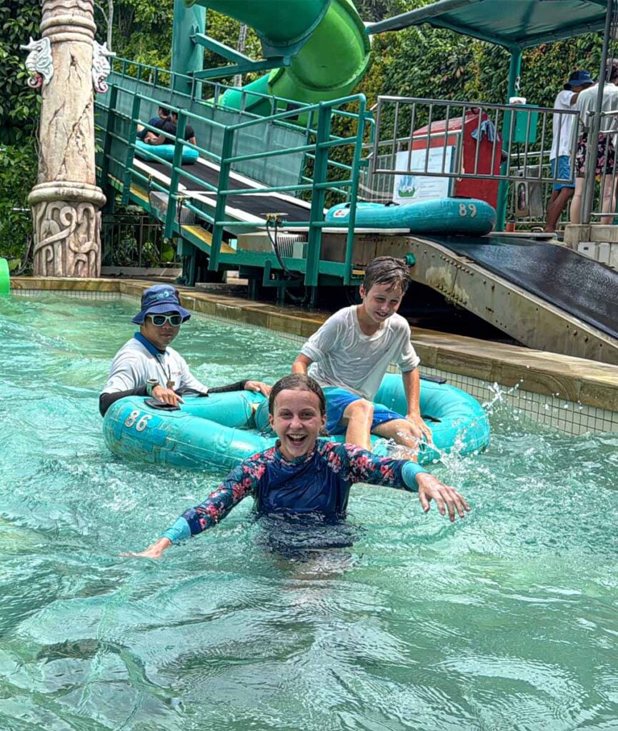 The Brewer kids are very excited after riding the Riptide Rocket at the Adventure Cove Waterpark in Sentosa, Singapore.