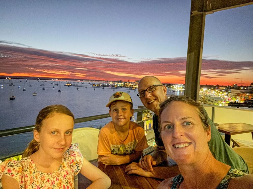 The Brewer family enjoys a special Christmas dinner with an ocean view in La Paz, Mexico.
