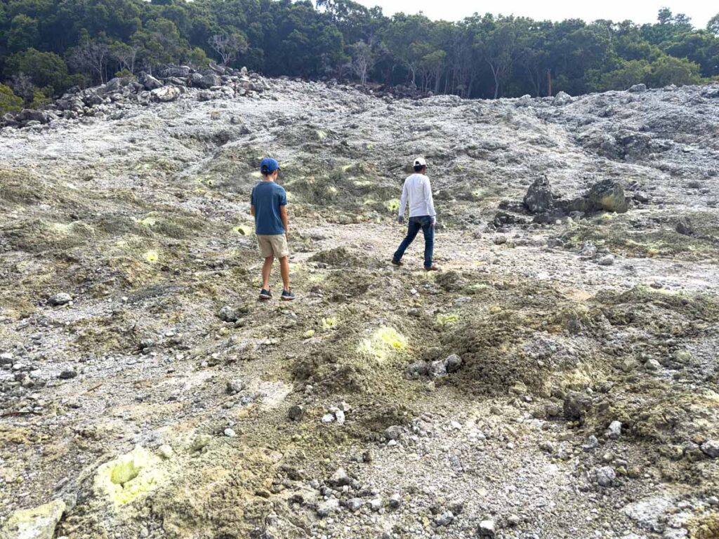 A Brewer child walks through Crater 2 at the Jaboi Geothermal Area on Pulau Weh.