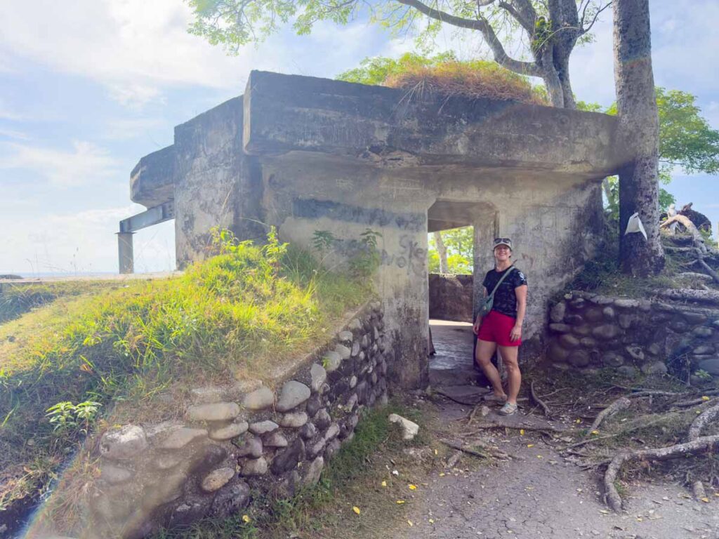 Celine Brewer stands outside a building during a visit to the Japanese bunker during a tuk tuk tour of Pulau Weh.