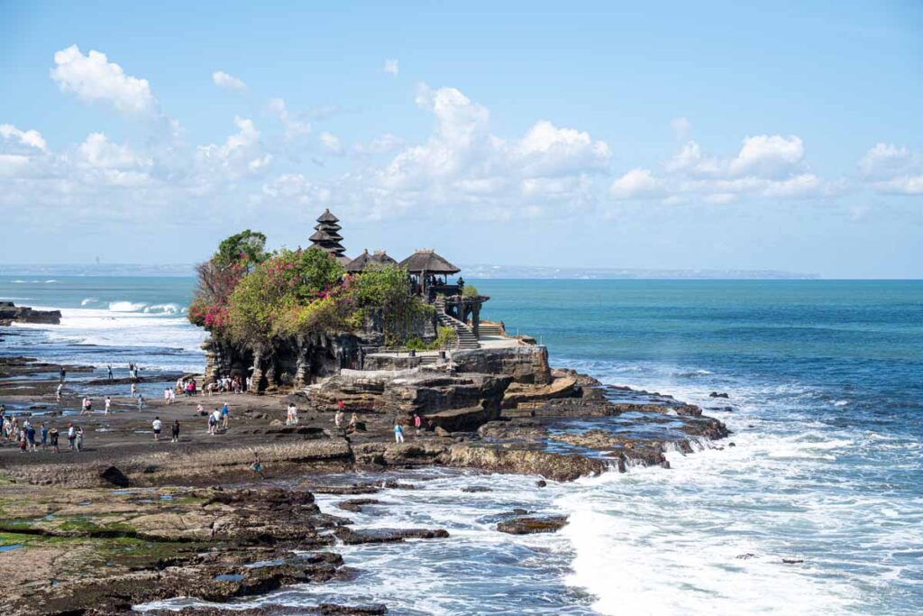 Tanah Lot surrounded by ocean in Bali, Indonesia.