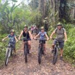 activities in Bali with kids - Northern Bali Bike Tour - Brewer family Celine and Dan Brewer, owners of FamilyCanTravel.com, on a family-friendly bike tour in northern Bali.